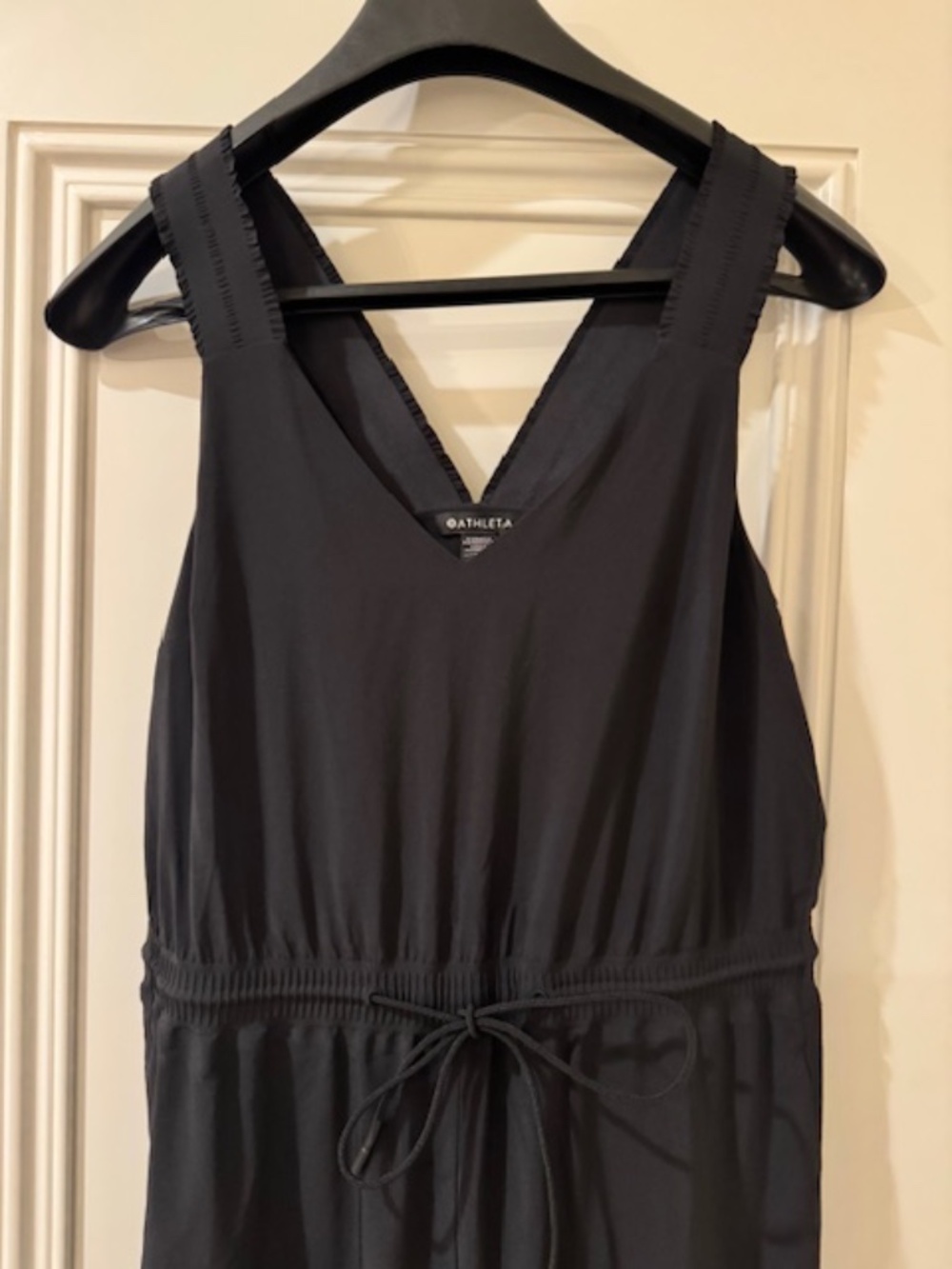 Worn ONCE- in LIKE-NEW condition!  $149 Black Athleta Jumpsuit Pockets, Size 10